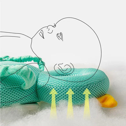 Teal mesh pillow with yellow arrows indicating airflow on a white background
